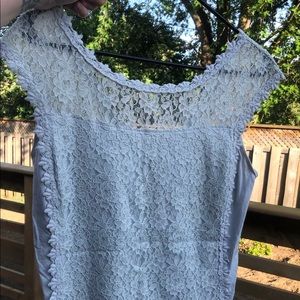 Beautiful lace sleeveless blouse with a v back